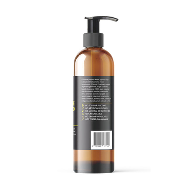 Opposite side of label of Pump bottle of Sensitive Dog shampoo Chamomile, Orange & Rosewood on a white background