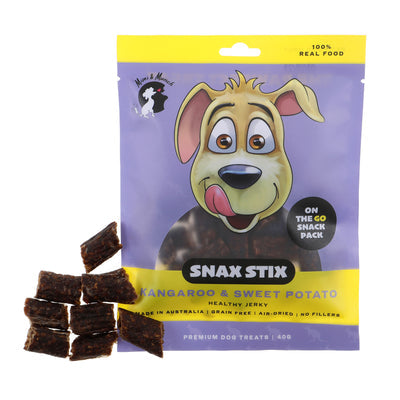 Snax Stix Kangaroo & Sweet Potato Healthy Dog Jerky on a white background. 8 small pieces of the dark coloured meaty looking jerky are outside of the packet.