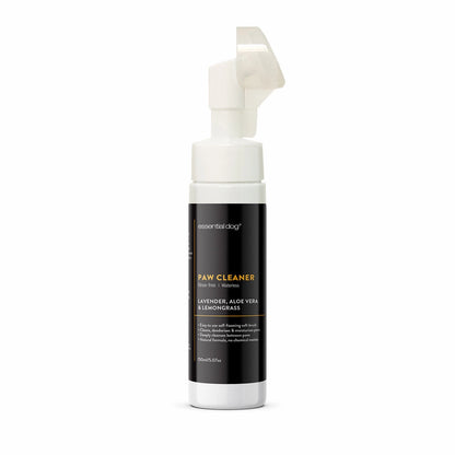 Rinse free paw cleaner for dogs on a white background. Showing the front label and brush head attachment